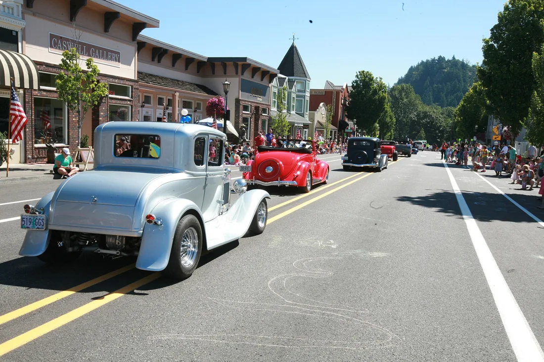 Vintage cars on a downtown Troutdale, Oregon, street, photographed July 18, 2015. Location context; Halloween activity is not pictured.