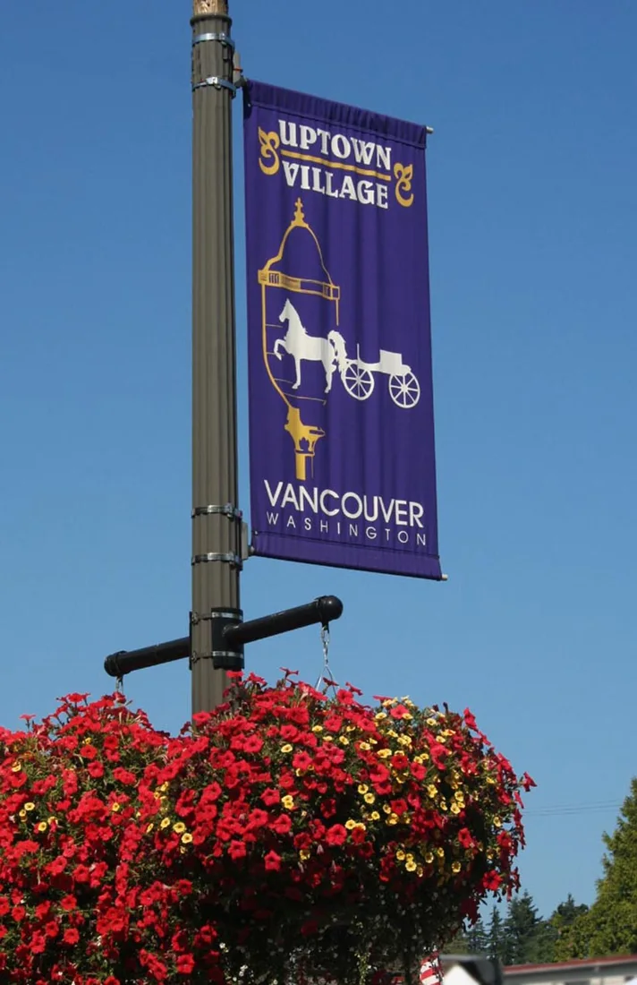 Uptown Village street banner in Vancouver, Washington, photographed August 20, 2006. Location context; Halloween activity is not pictured.